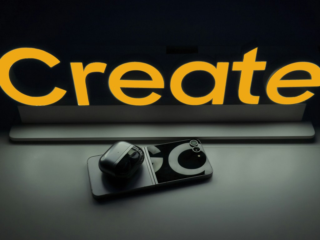 a dark image of a smartphone with the word 'Create' above it.